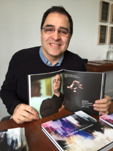 photograph of Leonardo Maldonado with book